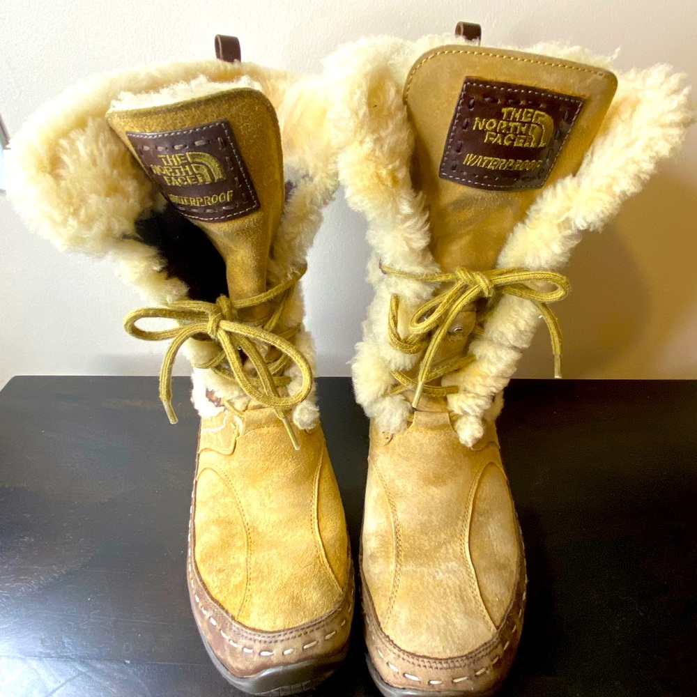 The North Face brown waterproof faux fur lined lace up winter boots, size 8.5